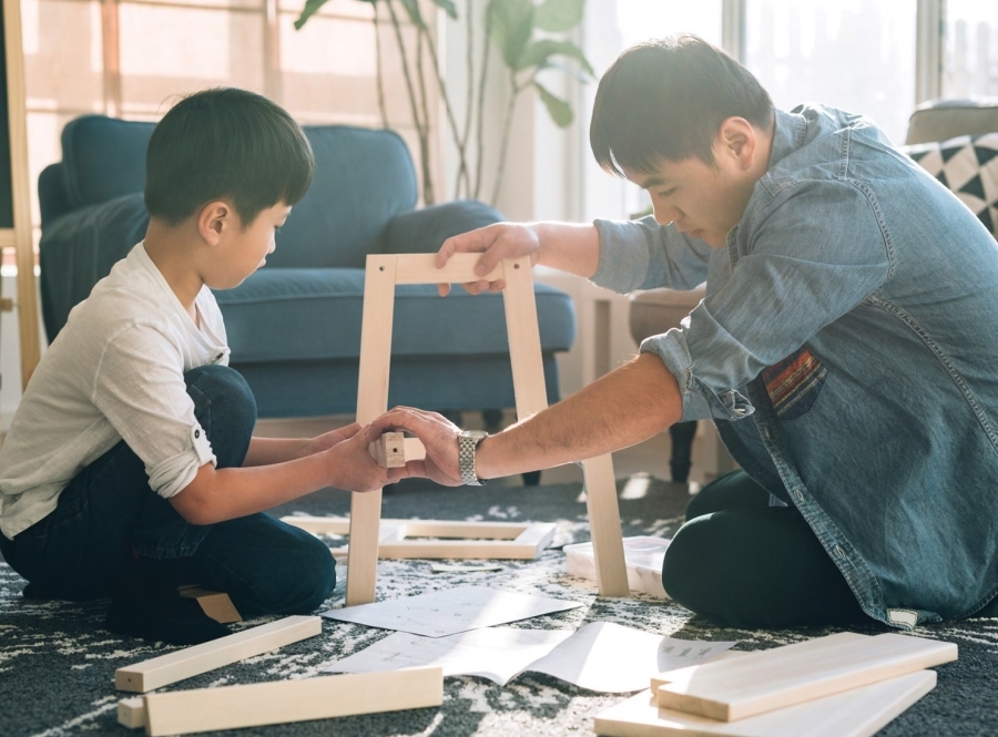 Father and Son Putting Furniture Together